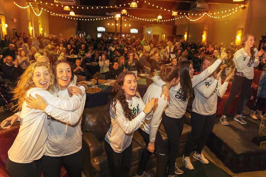 UWGB girls basketball team celebrates a tournament selection