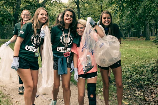 Students volunteering in litter clean-up event