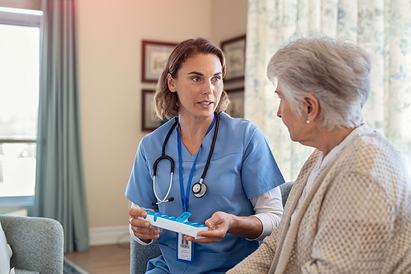 Nurse explaining medicine to client