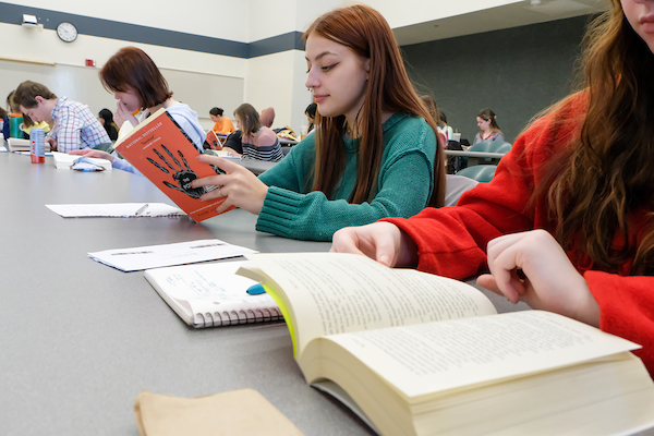 Girls reading books in classs