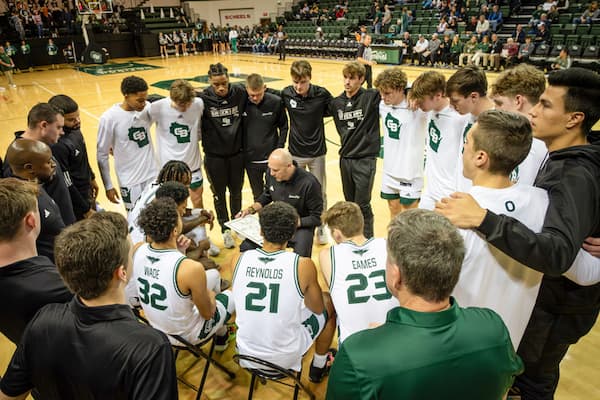 UW-Green Bay Men's Basketball Team huddle before game