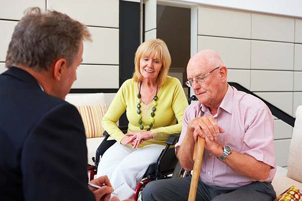 cbrf administrator meeting with two seniors