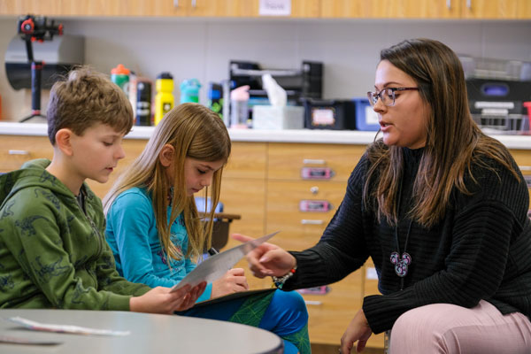Education student teaching elementary class