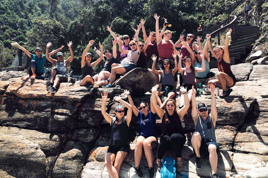 Students sitting on Niagra Escarpment